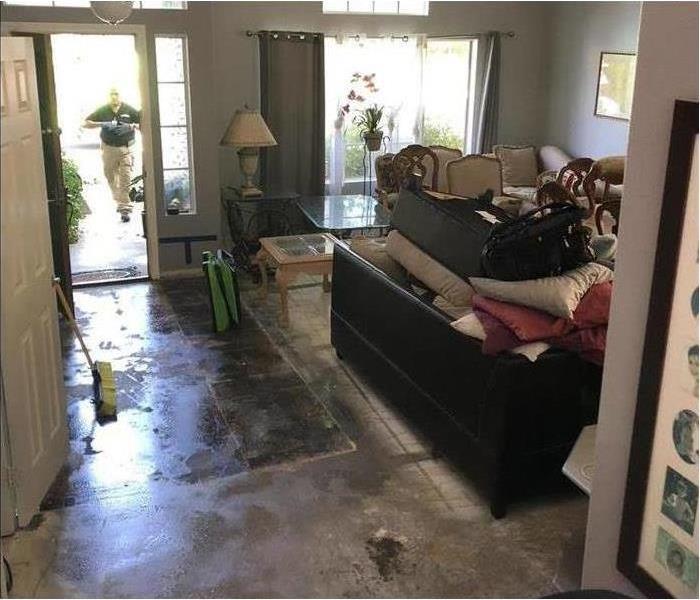 Living room affected by water damage
